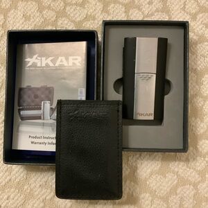 Xikar Black and Silver Torch Lighter w/leather case & original box/papers